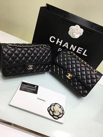 CHANEL black medium size 25 lambskin Leather Flap Bag with Gold/Silver Hardware 