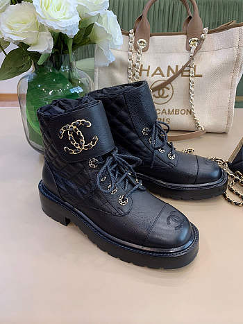 Chanel CC boots