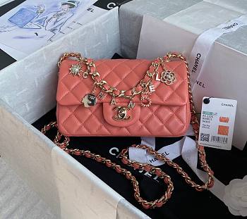 Chanel charm orange smooth leather flap bag