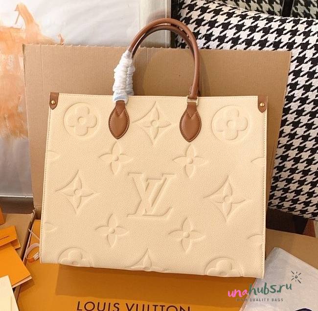 LV Onthego GM Monogram Empreinte Leather Cream M44925 - 1