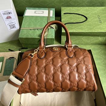 Gucci GG Matelassé leather medium duffle brown bag
