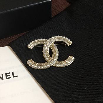 Chanel pearl brooch