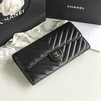 Chanel black chevron lambskin gold hardware wallet
