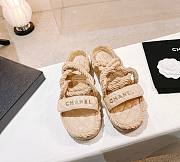 Chanel slippers beige in raffia - 1