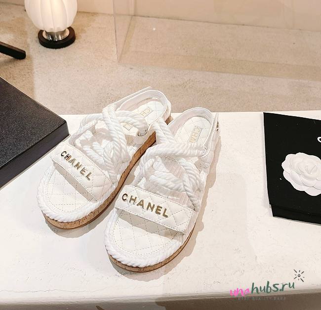 Chanel slippers white in raffia - 1