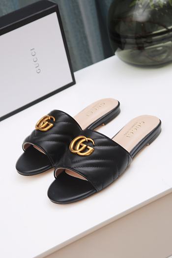 Gucci GG matelasse black slide sandal