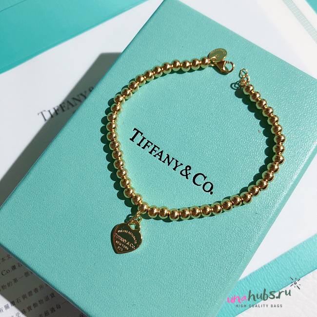 TIFFANY & CO. Sterling Gold Heart Tag Bracelet - 1