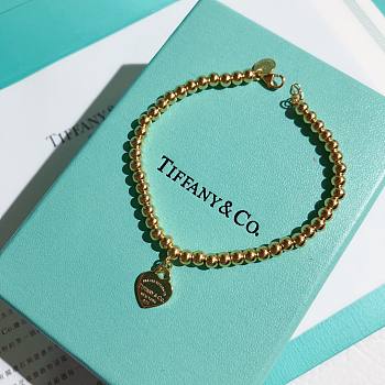 TIFFANY & CO. Sterling Gold Heart Tag Bracelet