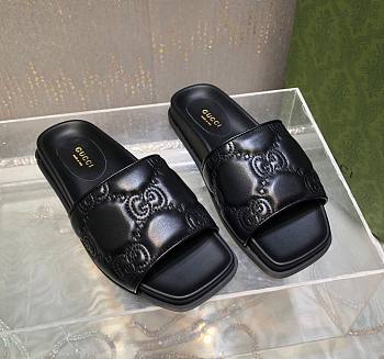 Gucci GG canvas leather slippers