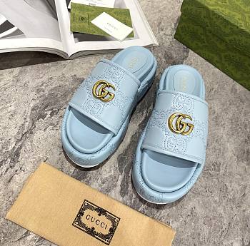 Gucci blue leather slippers