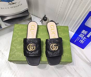 Gucci black GG leather slippers