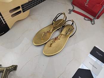 YSL Cassandra gold patent leather slingback sandals