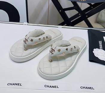 Chanel white charm puffer slippers