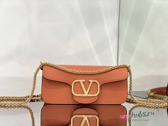 Valentino Garavani Locò orange leather crossbody bag - 1