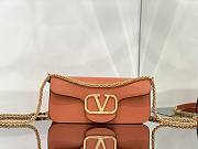 Valentino Garavani Locò orange leather crossbody bag - 1