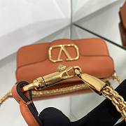 Valentino Garavani Locò orange leather crossbody bag - 3