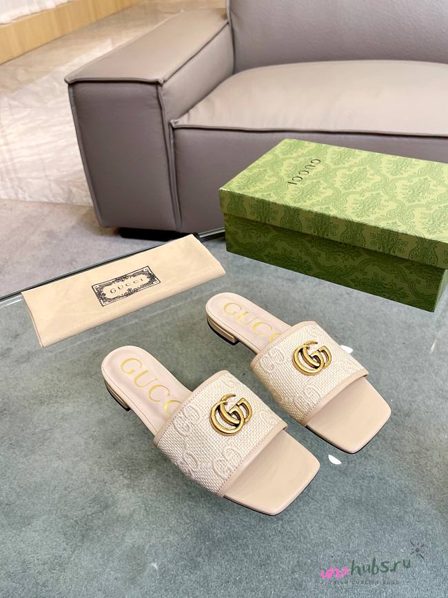 Gucci Doppia GG logo-motif white slippers - 1