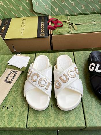 Gucci bold logo white leather sandals