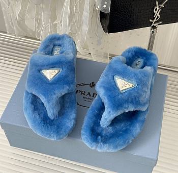 Prada blue shearling slippers