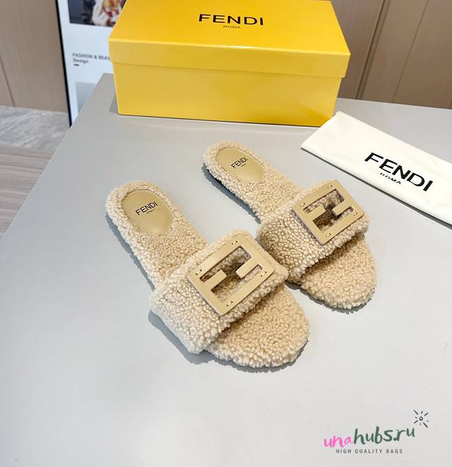 Fendi Baguette beige sheepskin slides - 1