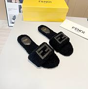 Fendi Baguette black sheepskin slides - 1