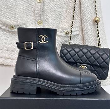 Chanel mid calf black leather boots