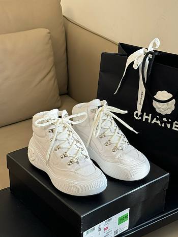 Chanel white sneaker boots