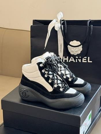 Chanel white & black sneaker boots