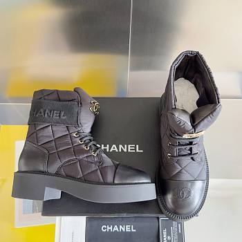 Chanel puffy black boots