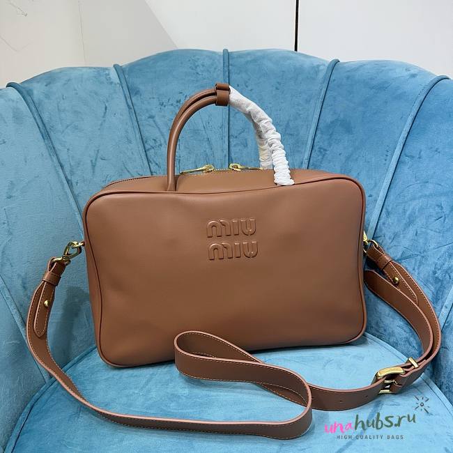 Miu Miu logo embossed brown leather tote bag - 1