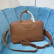 Miu Miu logo embossed brown leather tote bag - 1