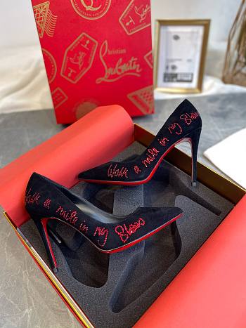 Louboutin red letter black heels 