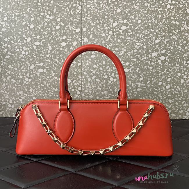 Valentino Garavani orange rockstud hand bag - 1