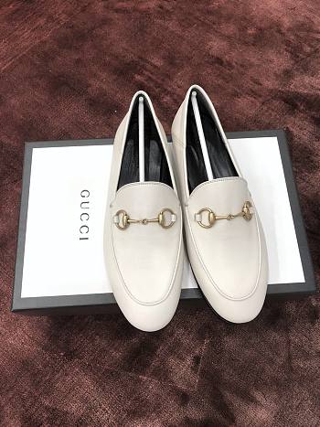 Gucci white loafers