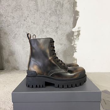 Balenciaga yellow painted strike boots