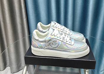 Chanel silver patent trainers 