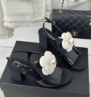 Chanel black camellia flower flatform heel