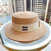Miu Miu Logo raffia boater hat in beige - 1