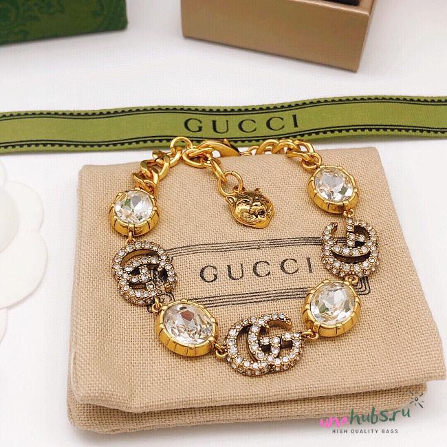 Gucci Crystal GC And Tiger Charm Gold Bracleet - 1