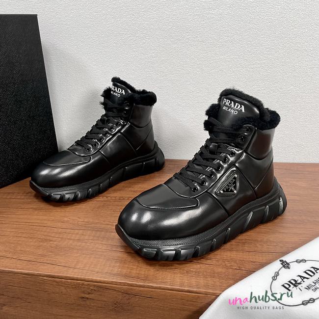 Prada Shearling-trimmed leather ankle boots - 1