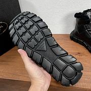 Prada Shearling-trimmed leather ankle boots - 6