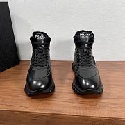 Prada Shearling-trimmed leather ankle boots - 2