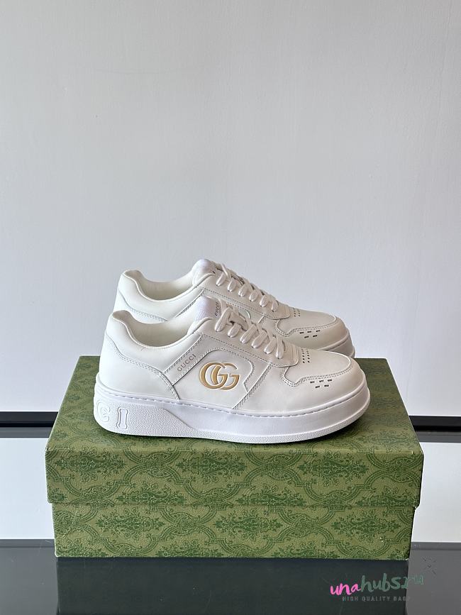 Gucci GG embossed trainer in white leather  - 1