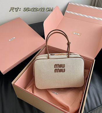 Miu Miu  Beau canvas and leather bag - 35x22x12cm