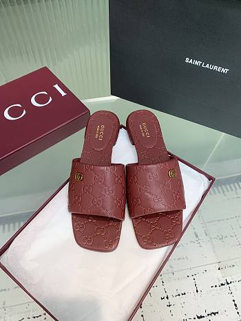 Gucci slide sandal with Double G Leather