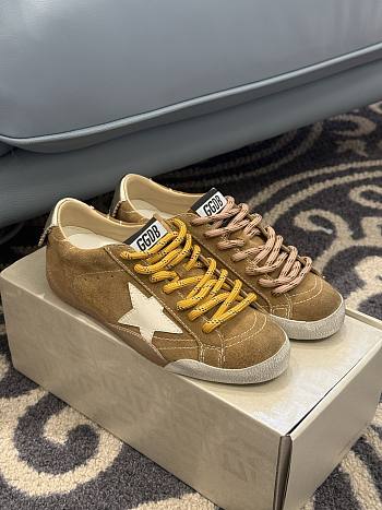 Golden Goose True-Star in tobacco-colored suede with white star and platinum heel tab