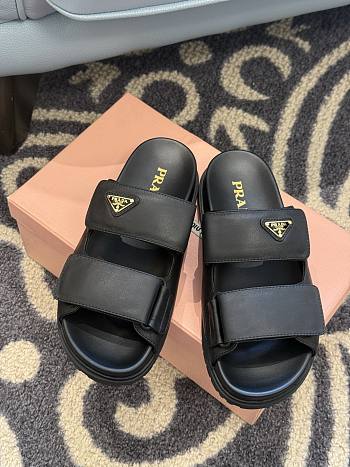 Prada Leather Slides in white/black