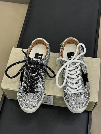 Golden Goose True-Star in silver sequins with black star and beige leather heel tab