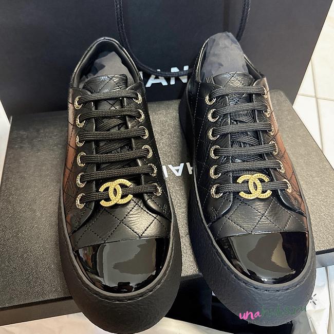 	 Chanel Black Lambskin Sneakers - 1