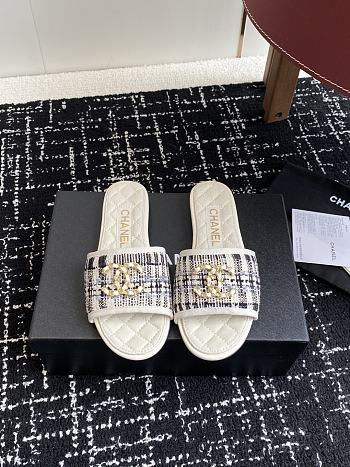 	 Chanel White Quilted Slides